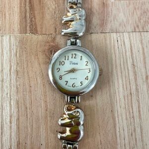Vivani ladies round elephant bracelet fashion watch NEW BATTERY